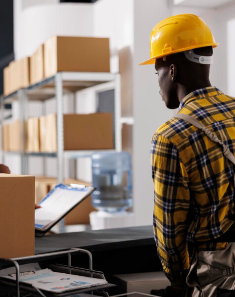 courier-checking-orders-list-receiving-parcel-retail-storehouse-african-american-warehouse-managers-preparing-package-delivery-invoice-reception-desk-storage-room